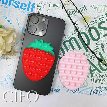 CIEO Silicone Phone Grip, Strong Suction, Fruit Shaped Phone Holder,Suitable for Selfies and Videos on Mirrors, bathrooms and Smooth Surfaces, Compatible with iPhone, Samsung.(Strawberry Shaped, red)